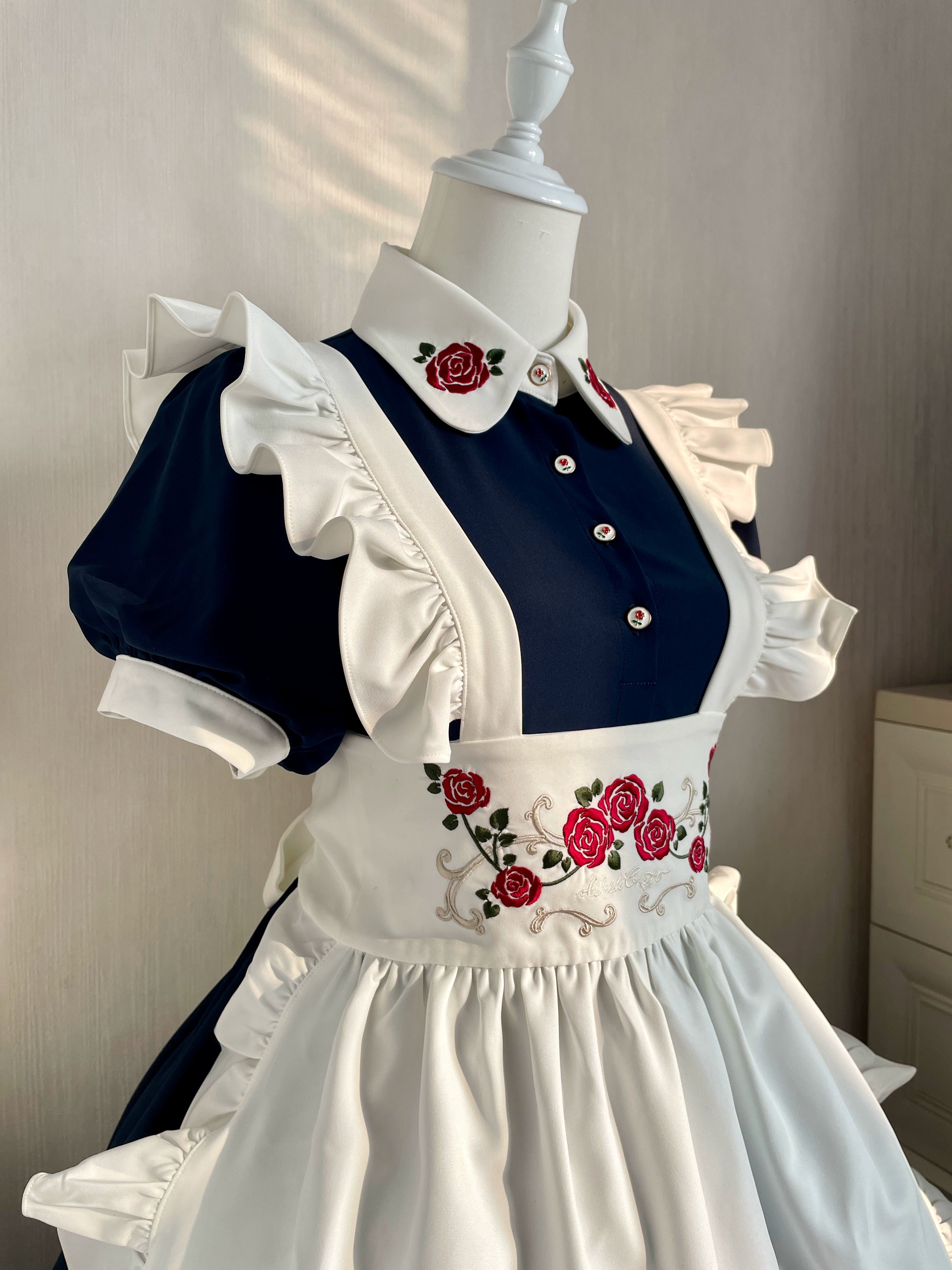 Maid-style dress with red rose embroidery and apron