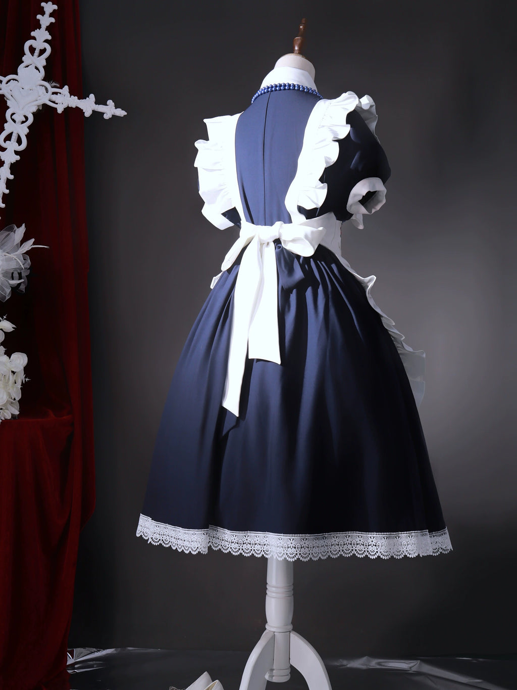 Maid-style dress with red rose embroidery and apron