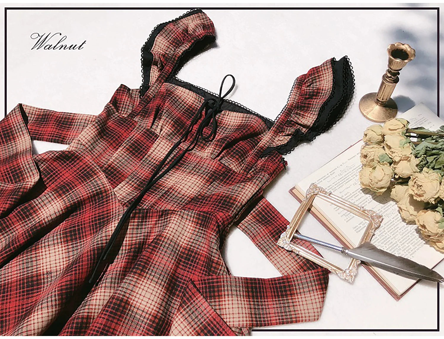 Red checked bicolor jumper skirt and black blouse
