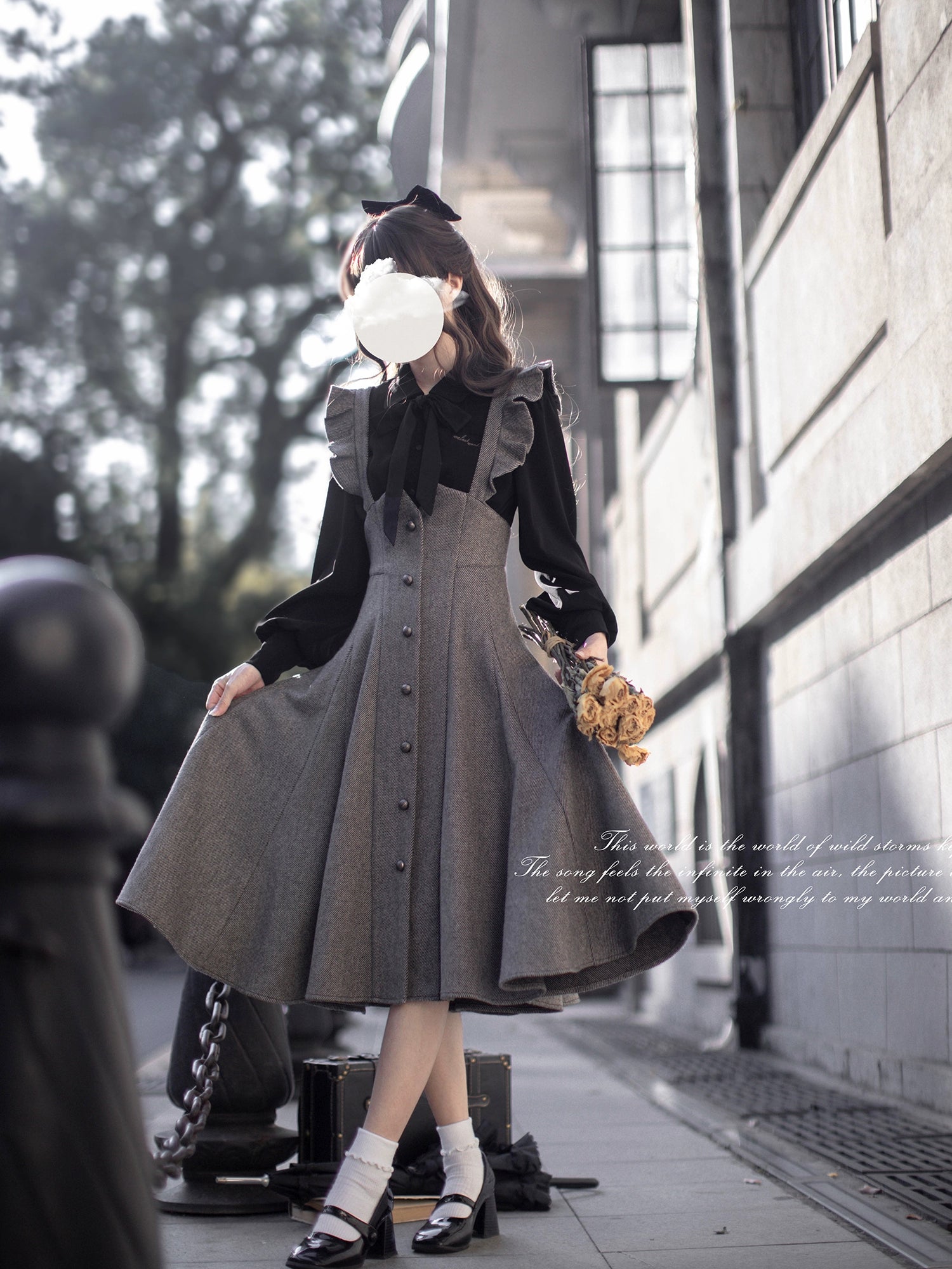Gray metal button jumper skirt and ribbon tie blouse