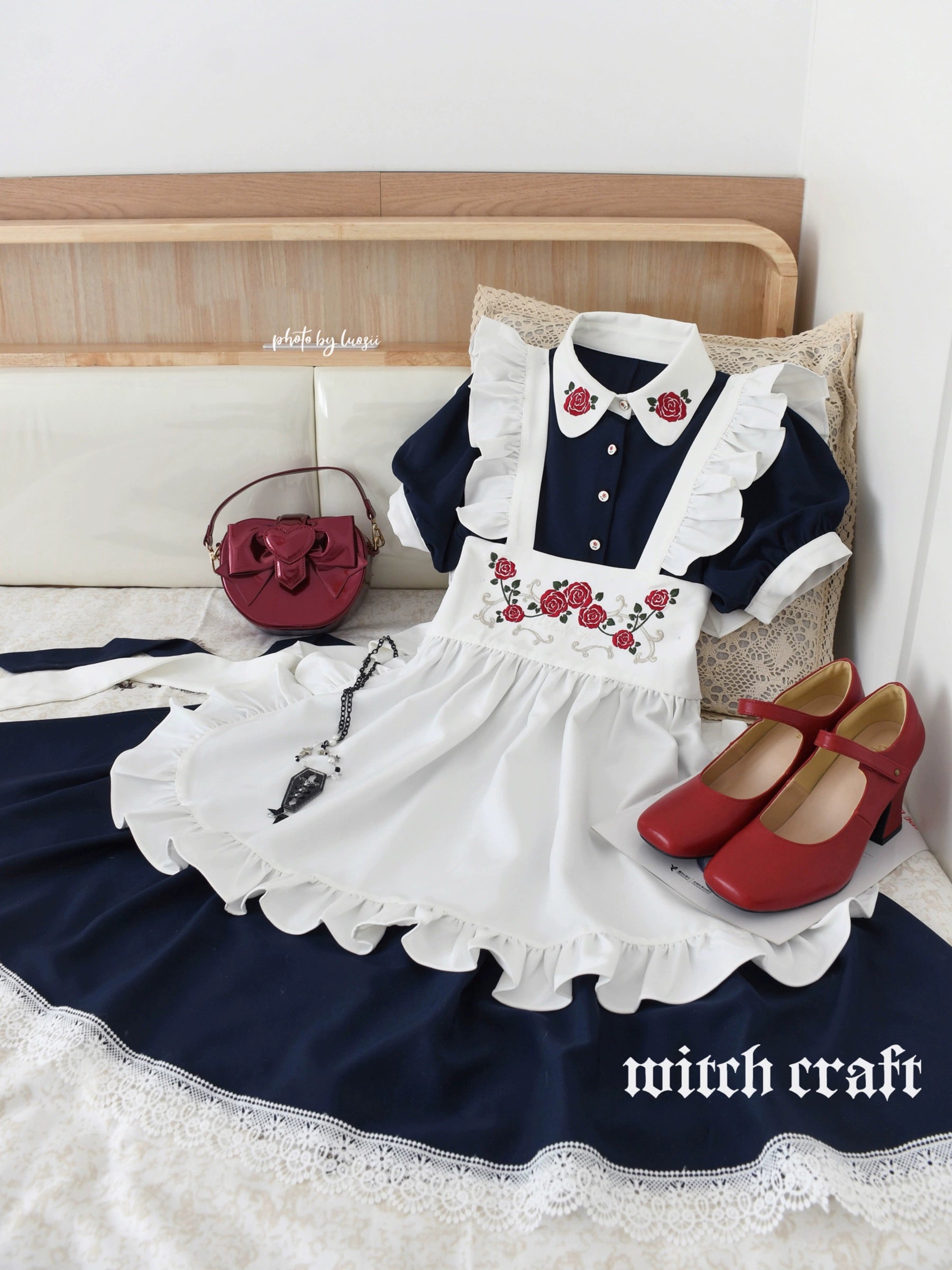 Maid-style dress with red rose embroidery and apron