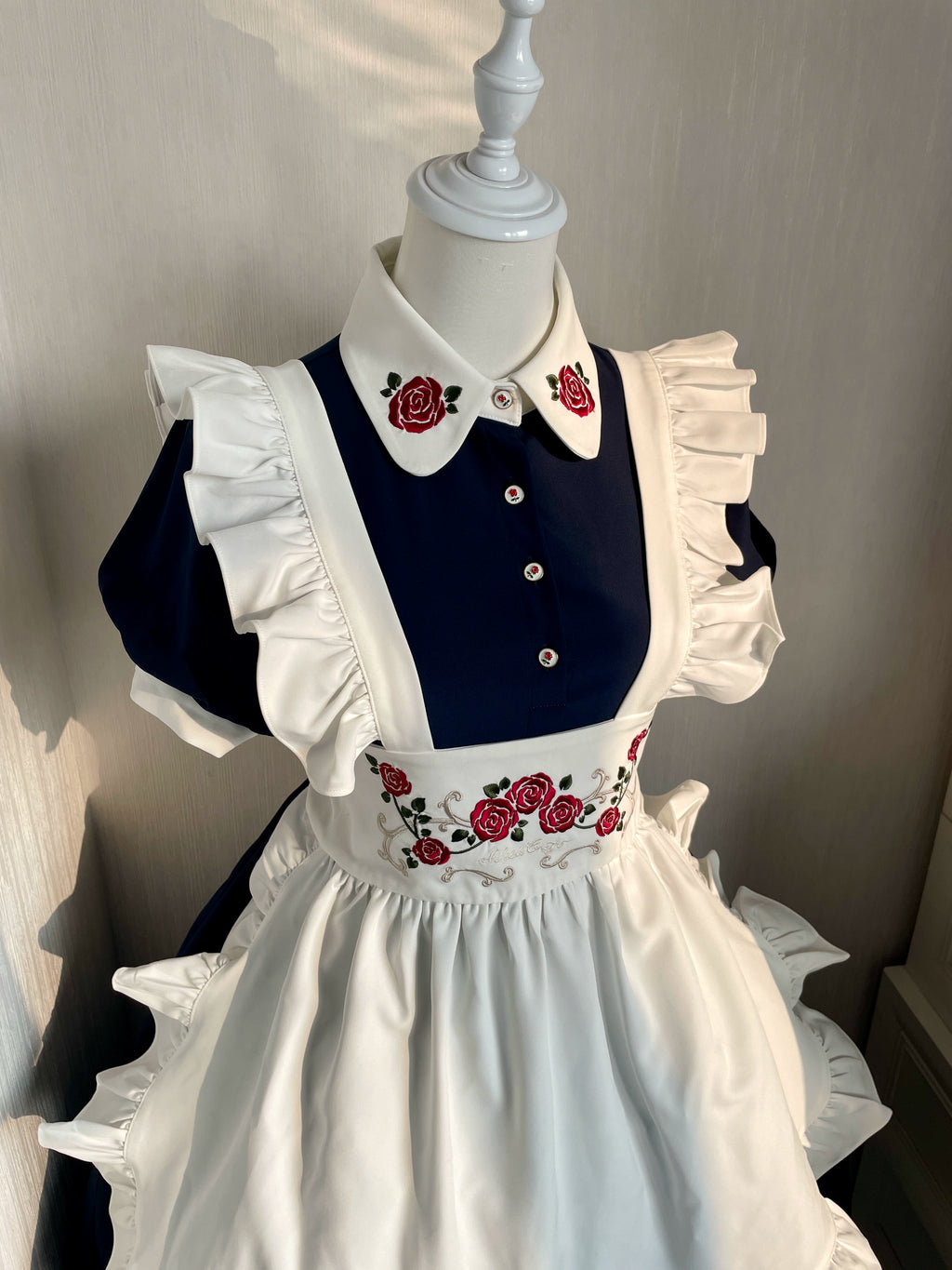 Maid-style dress with red rose embroidery and apron