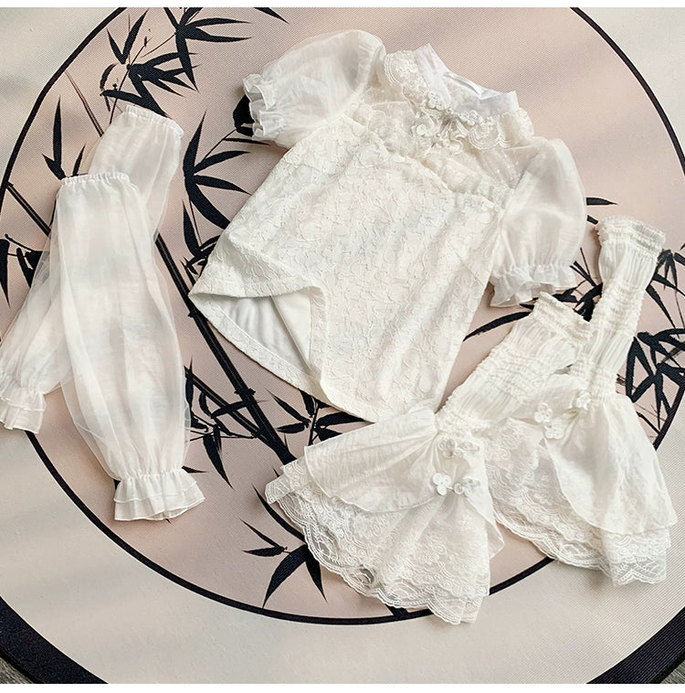 Lace floral blouse with detachable sleeves