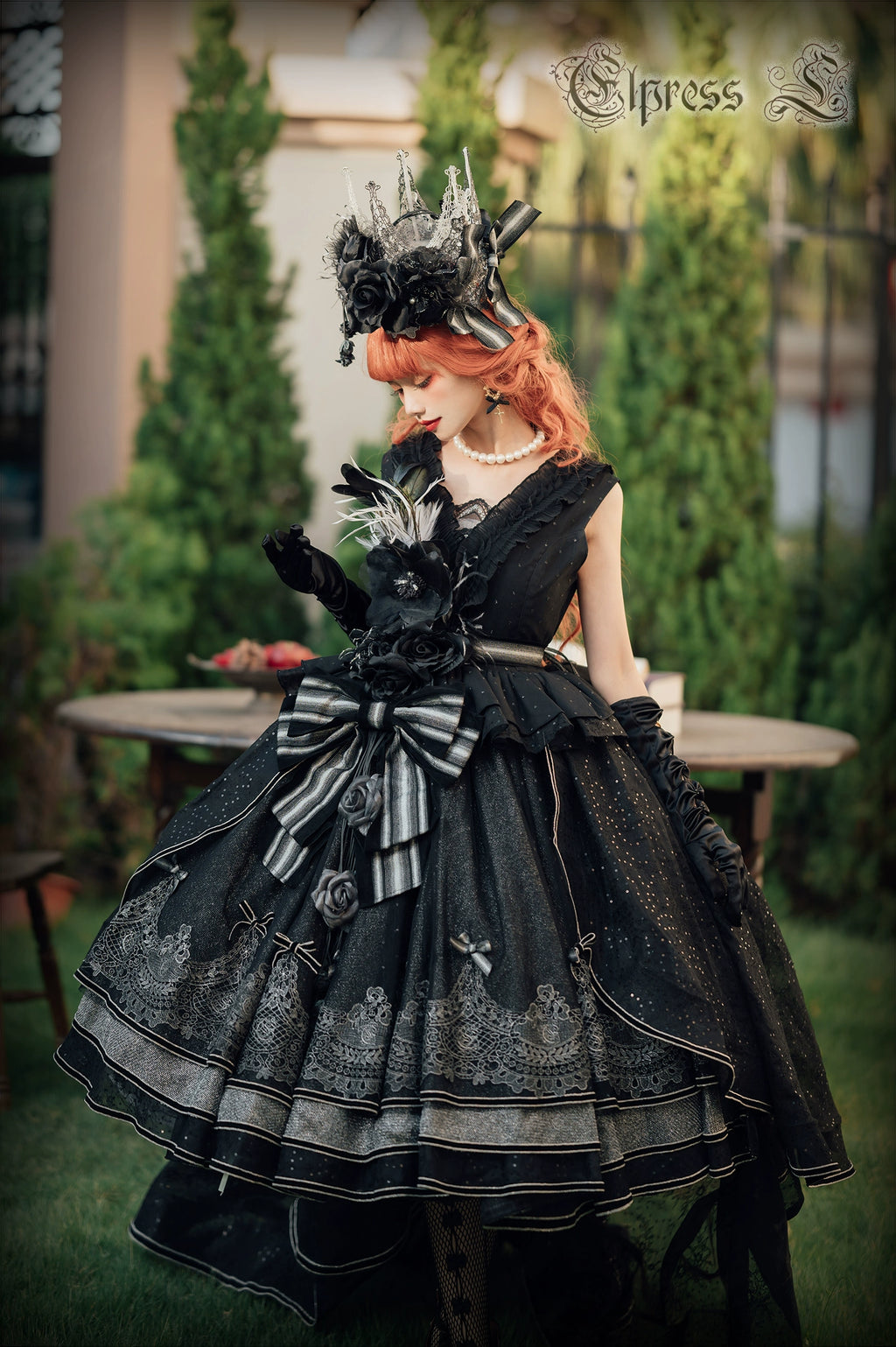 Rose Throne A dress with sparkling ribbons and flowers