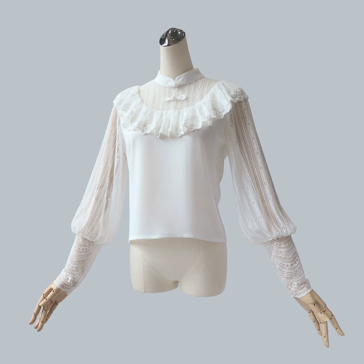 Sheer blouse with Chinese buttons