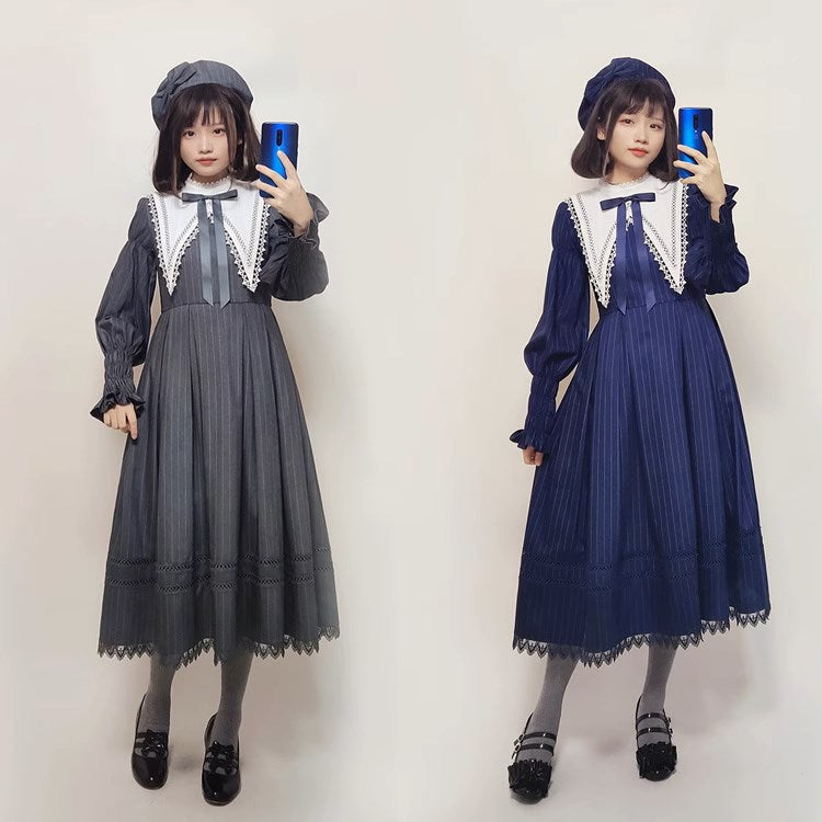 大きな付け襟付きのピンストライプワンピース